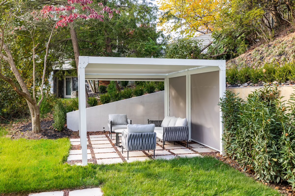 Completed custom home opening to a landscaped rear garden