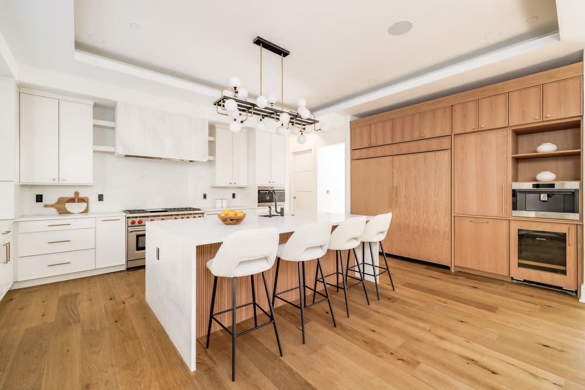 Professionally photographed Lybrook kitchen with a large island and integrated appliances