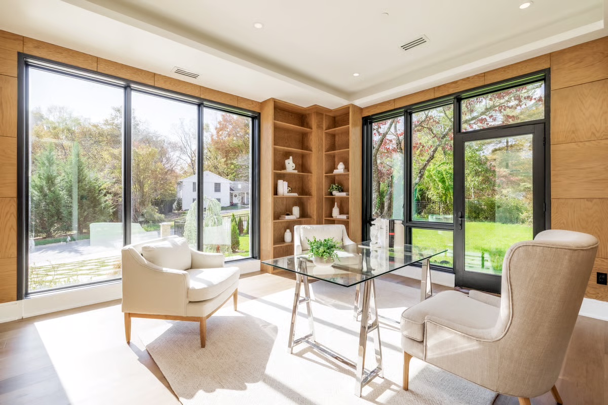 Professionally photographed custom-home office overlooking the landscaped site